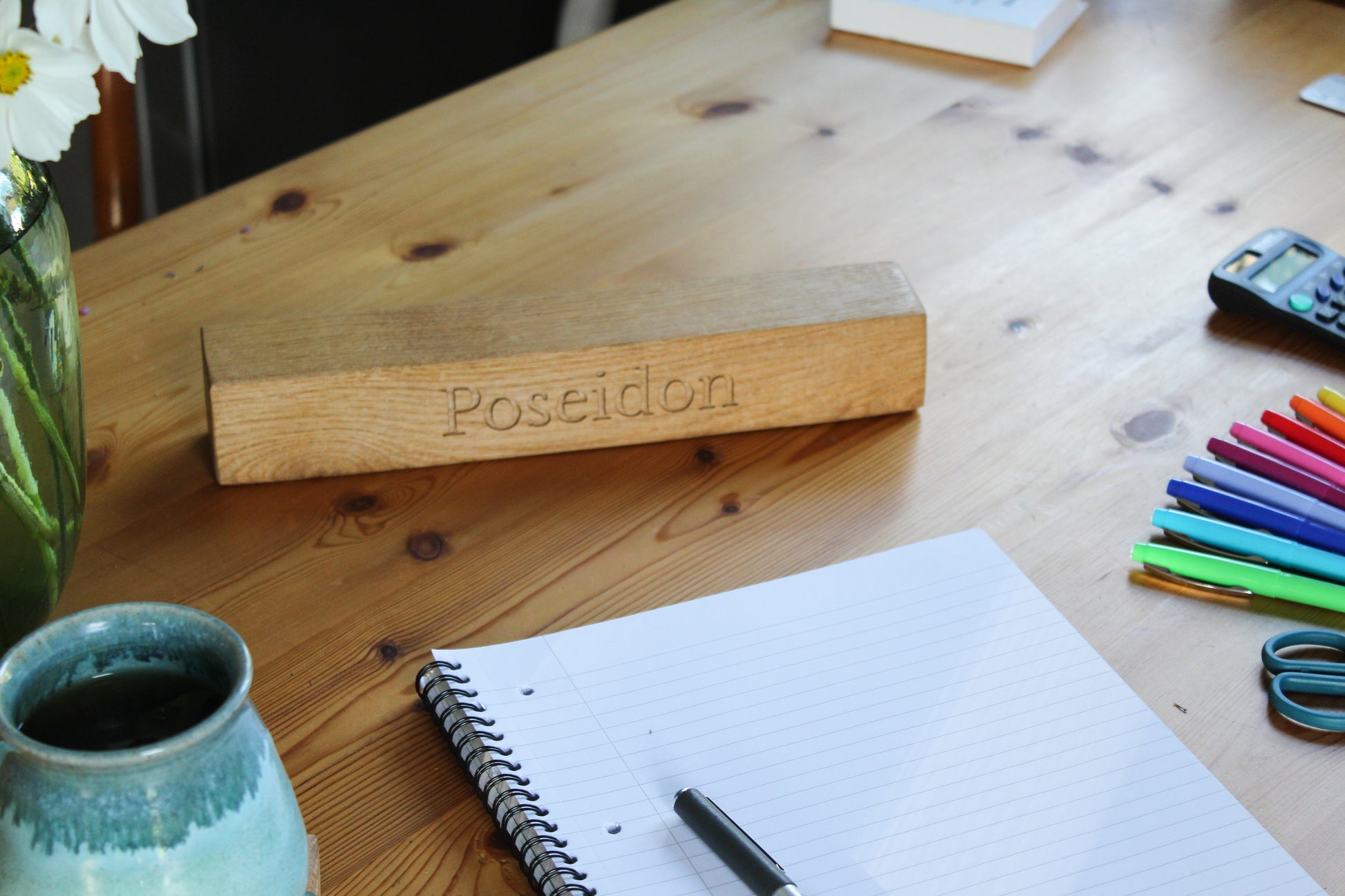 Teacher's desk with wooden name plaque