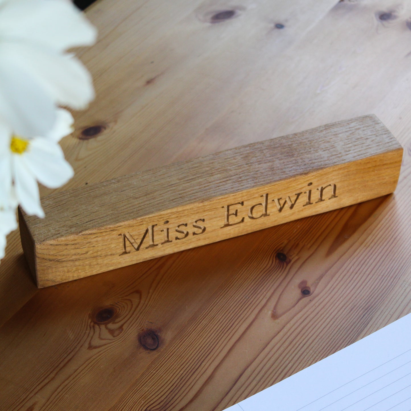 Teacher's desk with wooden name plaque